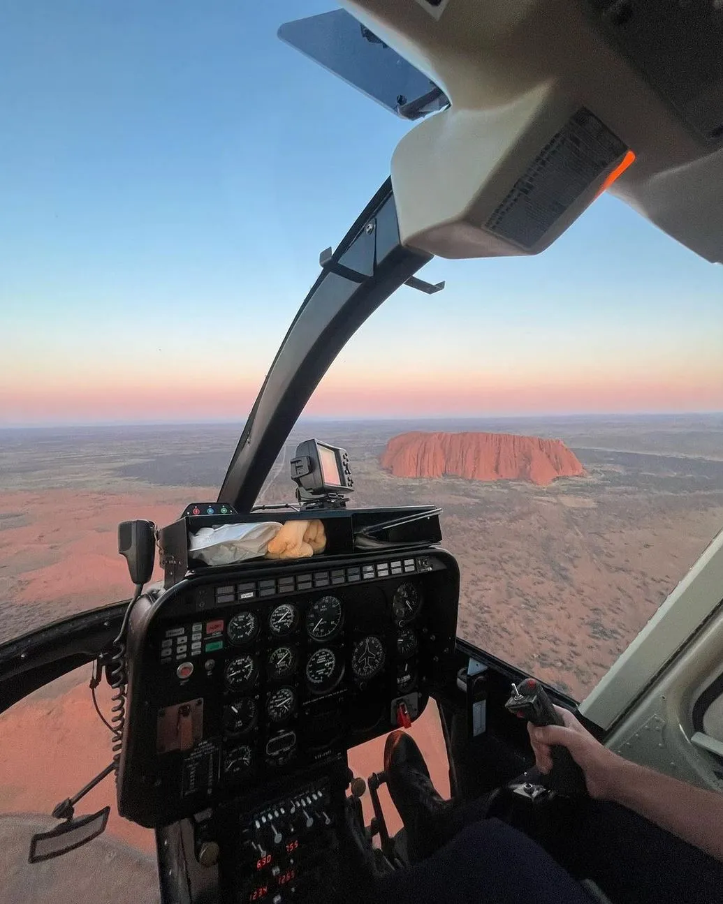 New Age Auto Store | Can I Get Helicopter or Aerial Shots of Uluru, and What Should I Know? Small Talk in the Sky
